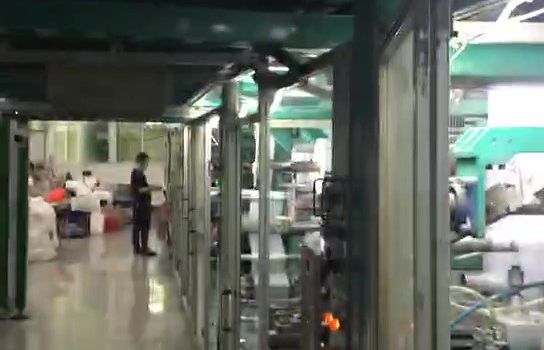 Pull up diaper machine
